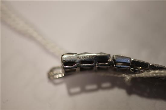 A 1920s/1930s Cartier, platinum, diamond and onyx line bracelet, 7.25in.